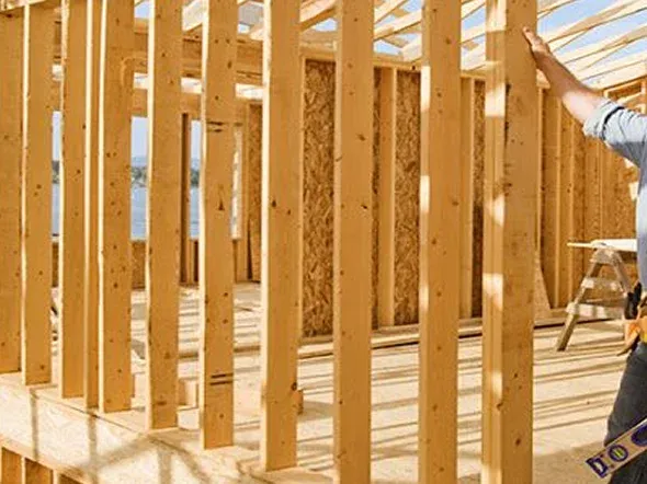 Wooden framework of a building under construction Wooden framework of a building under construction