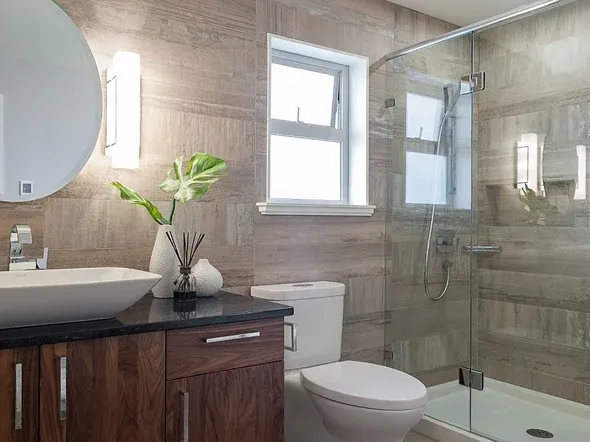 bathroom with glass shower and wooden vanity bathroom with glass shower and wooden vanity