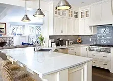 kitchen with white cabinetry, a large island